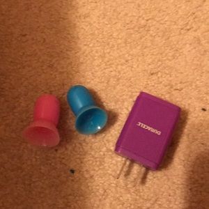 2 dog pop sockets and a portable box